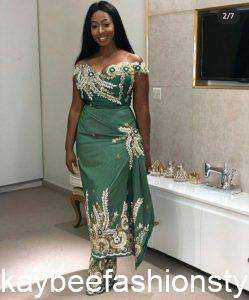 Latest Wrapper Gown Styles for Ladies in 2023 and 2024 - Kaybee Fashion ...